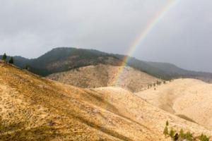 Rainbow Over Mountains Near Doyle, CA